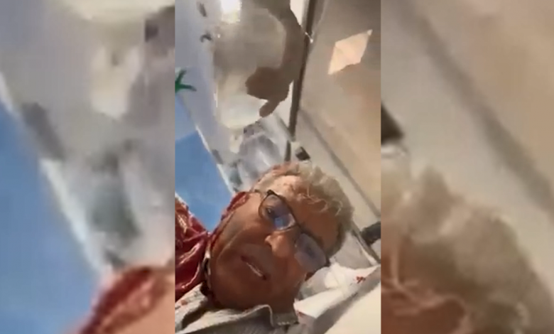 صورة إصابة الصحفي علي السمودي برصاص السلطة خلال تغطيته مسيرة لأهالي مخيم جنين.